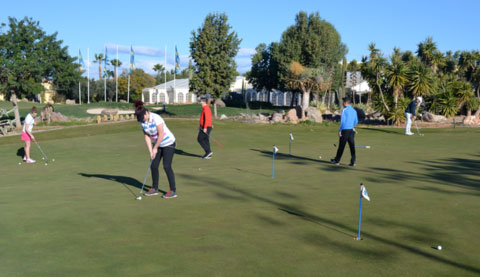 Hartpury Golf Academy students working on there putting technique at the Desert Springs Short Game Academy.